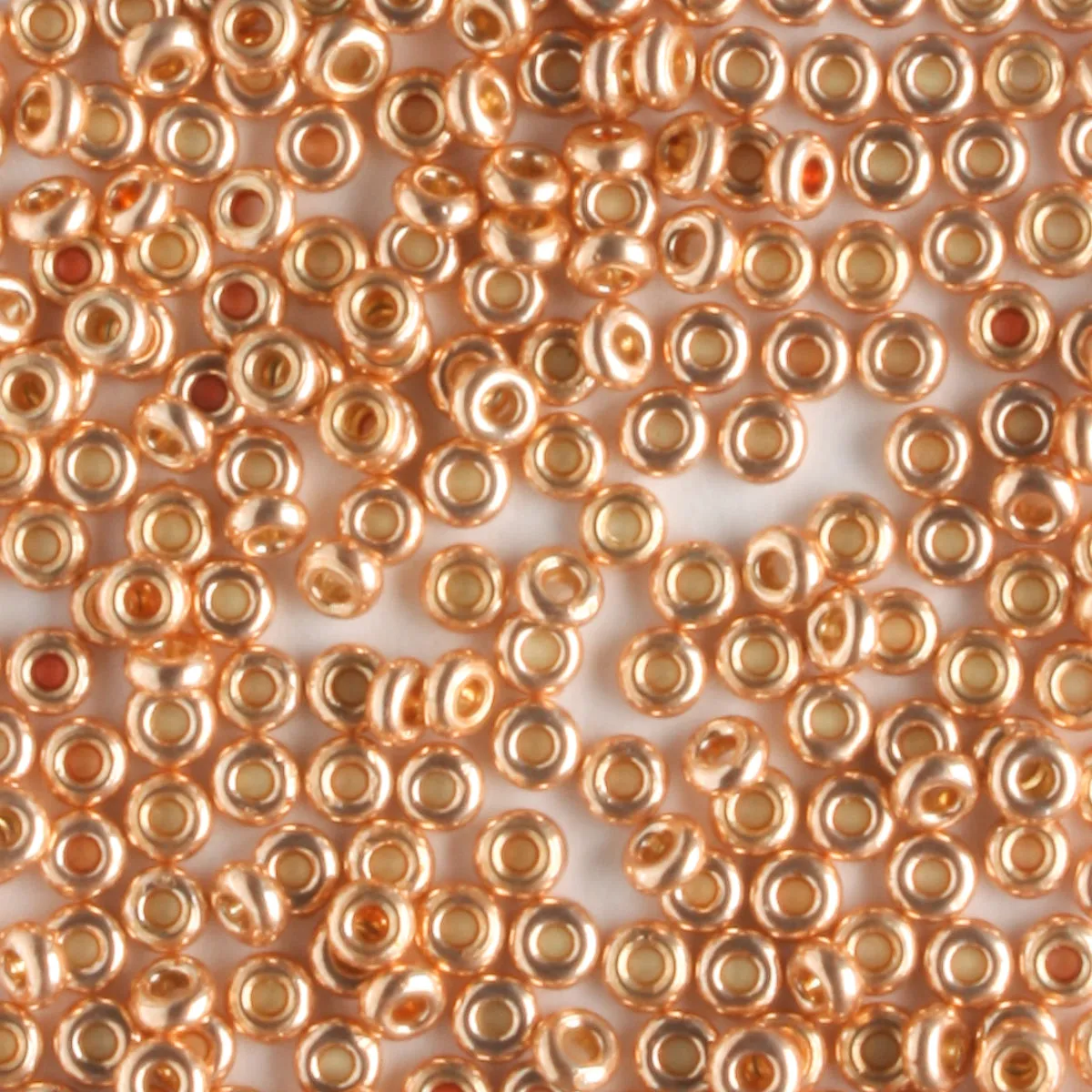 11/0 Demi Round PermaFinish Rose Gold - 10 grams